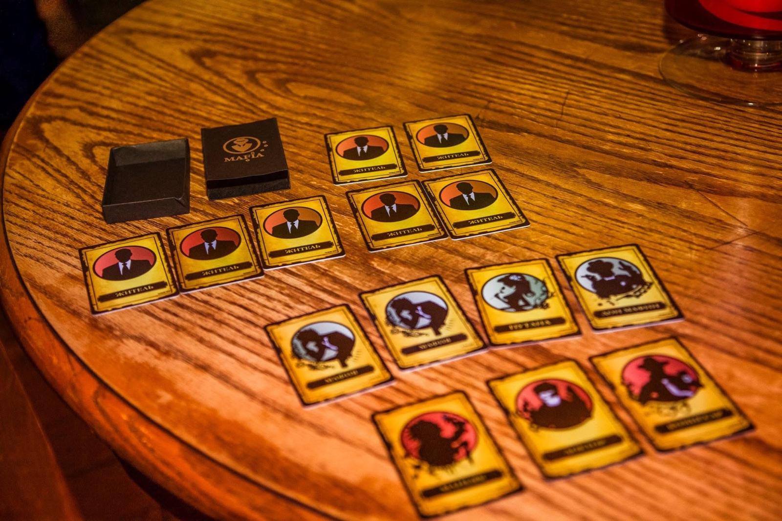 Mafia game cards on a table